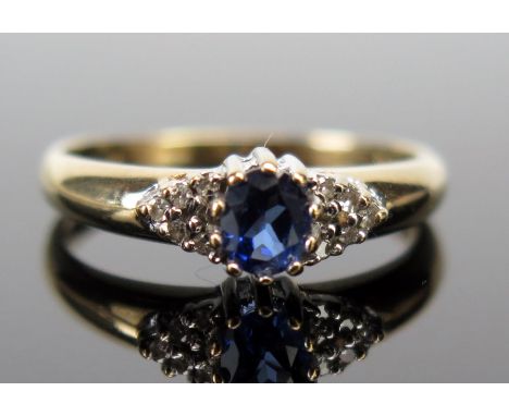 A 9ct Gold, Sapphire and Diamond Ring, c. 5x4.2mm sapphire, full hallmarks, size O.5, 2.1g 