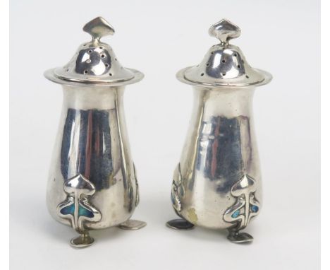 A pair of Edward VII silver and enamel pepperettes, maker Mappin &amp; Webb, Birmingham, 1906, 8cm high, 70gms, 2.27ozs. 