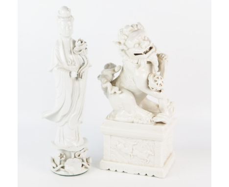 A blanc de Chine model of a temple dragon, standing on a rectangular plinth, 33cm high, together with a figure of Guan Yin, 3