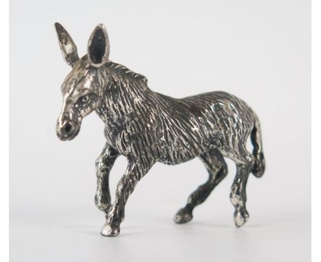 A white metal model of a donkey, 5cm long, 29gms, 0.80ozs 