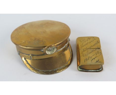 A World War One trench art miniature brass box in the form of a peaked cap together with a brass cigarette lighter, "Souvenir