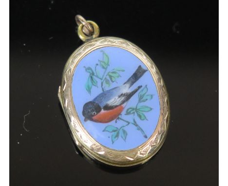 An Enamel and Yellow Metal Locket decorated with a bullfinch and chased foliate work, c. 27mm drop, 6g 