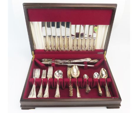 A silver plated six setting flatware service, with shell, scroll and beaded decoration, includes, tablespoons, soup ,dessert,