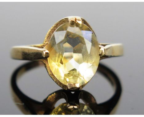 A 9ct Gold and Citrine Dress Ring, c. 9.8x8mm stone, size J.5, 2.3g 