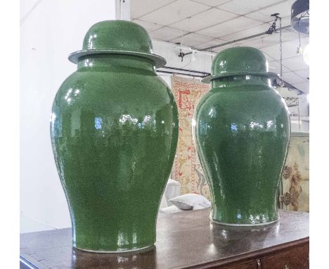 TEMPLE JARS WITH COVERS, a pair, Chinese style leaf green ceramic, 54cm H. (2)