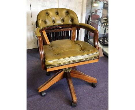 DESK CHAIR, 20th century buttoned olive green leather upholstery on a swivel base 83cm H x 61cm.