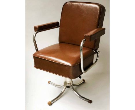 REVOLVING DESK CHAIR, mid 20th century hand finished tan leather revolving and reclining on an adjustable chrome base.