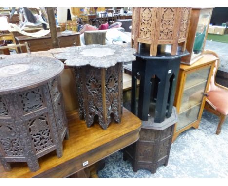 FIVE ORIENTAL OCTAGONAL OCCASIONAL TABLES, THREE WITH CARVED PANEL SIDES. 