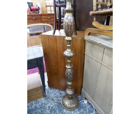 AN EASTERN BRASS STANDARD LAMP. 