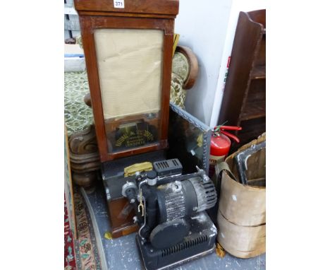 A NATIONAL CLOCKING IN CLOCK AND A PROJECTOR. 