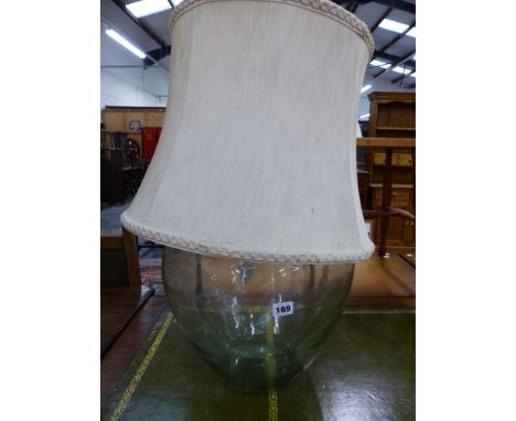 A LARGE BOTTLE LAMP. 