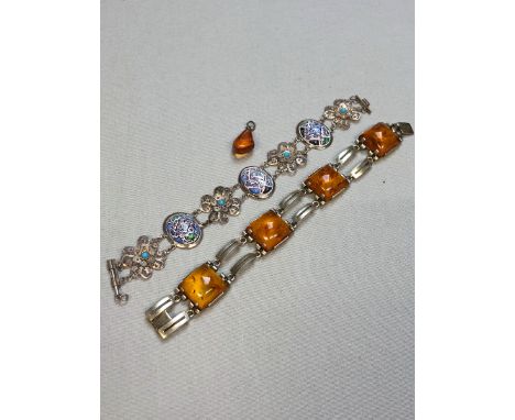 A GERMAN CONTINENTAL SILVER AND AMBER LINKED BRACELET STAMPED 835 TOGETHER WITH A PAINTED PANEL AND OPEN WORK PERSIAN STYLE B