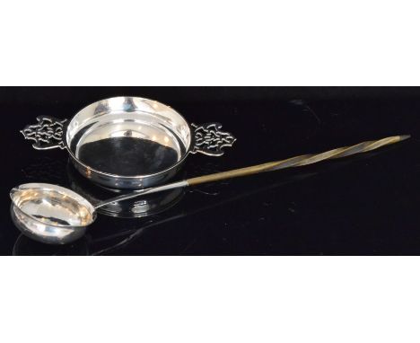 A late Victorian hallmarked silver quaich, the shallow circular bowl with two pierced scroll handles, width 17.5cm, weight 3.