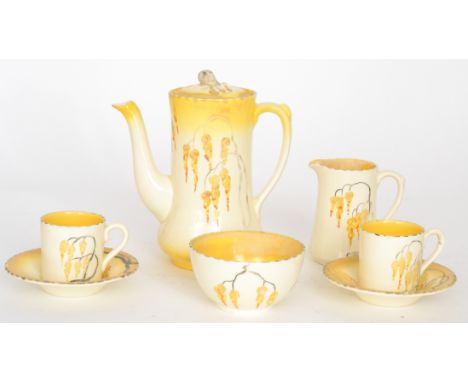 A 1930s Burleigh Ware coffee service comprising coffee pot, six coffee cups and saucers, milk jug and sugar bowl, each decora