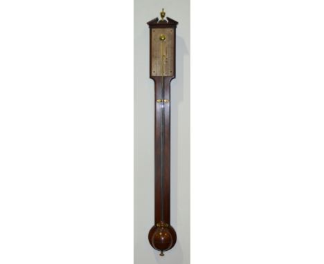 A 19th Century mahogany stick barometer with architectural pediment and brass final above the silvered register, signed Watki