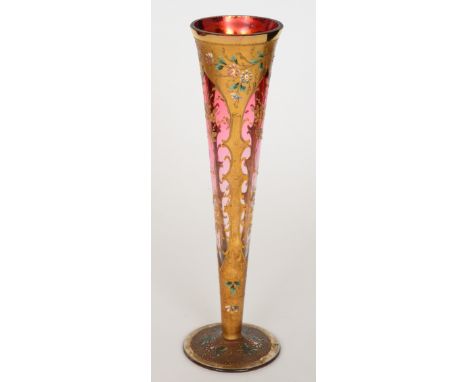 A late 19th to early 20th Century Venetian glass posy vase of footed flared form gilt and enamel decorated with flowers and f