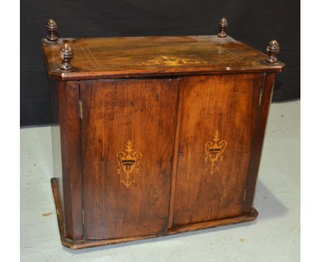 A late Victorian inlaid and figured walnut music cabinet, the fitted shelf interior enclosed by a pair of panel doors, width 