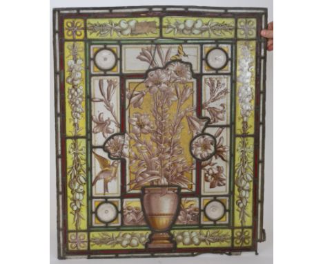 A 19th Century painted and leaded light glass panel of flowers in a vase, 76cm x 63cm, S/D, a smaller panel of roses within a