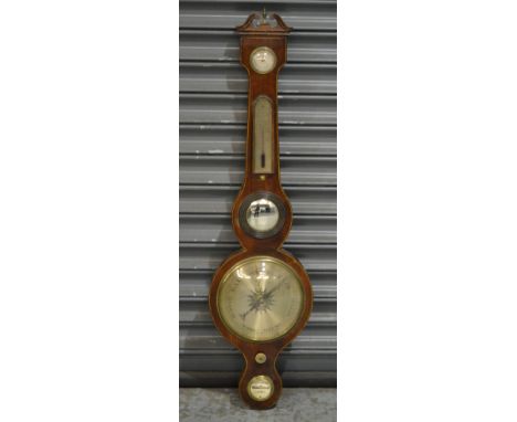 A George III line inlaid mahogany wheel barometer incorporating Dry/Damp dial and thermometer, height 96cm