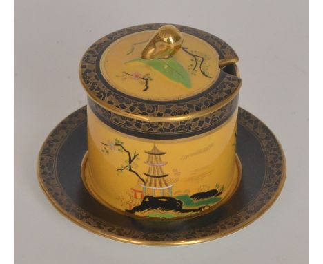 A 1930s Art Deco Carlton Ware Temple pattern preserve pot and saucer decorated with gilt and enamel Chinoiserie decoration ag