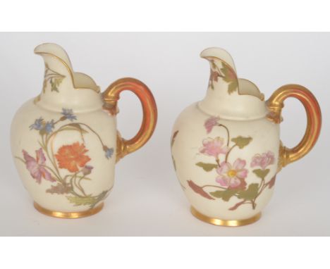 Two late 19th Century Royal Worcester flatback jugs each decorated with gilt and enamel floral sprays, printed marks, height 