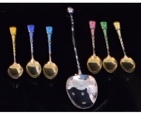 A set of six hallmarked silver gilt and enamel teaspoons, Birmingham, 1960, Walker and Hall, S/D, together with a hallmarked 