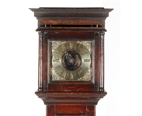 An 18th Century and later oak longcase clock, with brass 10 inch square dial and single hour hand, the movement later married