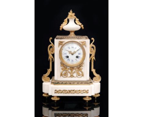 A 19th Century French gilt metal mounted white marble mantle clock, blue painted white enamelled dial below a surmounted urn 