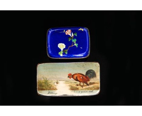 A small early 20th Century cloisonné trinket pot of rectangular form, detailed with a flowering bough upon a blue ground, wid