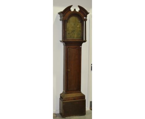 A 19th Century oak longcase clock, the engraved brass dial with eight day striking movement inscribed Peacock, Kimbolten, enc