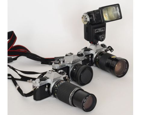 A parcel lot of assorted late 20th Century photographic equipment to include a Pentax camera, camera lenses and accessories. 