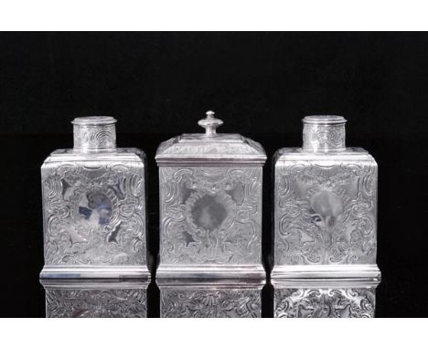 A pair of George II hallmarked silver tea caddies with matching sugar box, the rectangular caddies with detachable cylindrica