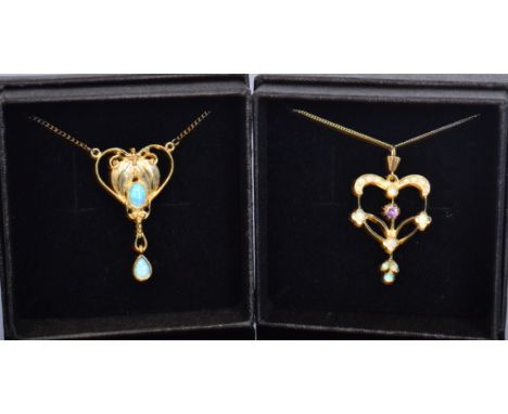 Two gold plated and synthetic opal art nouveau style pendants, one formed of two stylised gold leaves within looped border, c