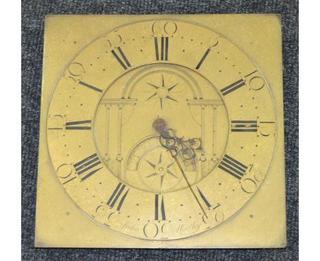 An 18th Century brass Masonic longcase clock dial, the arched date aperture engraved with pillar design inscribed John Hartle