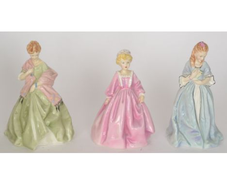 Three Royal Worcester lady figurines comprising First Dance, Grandmothers Dress and Sweet Anne