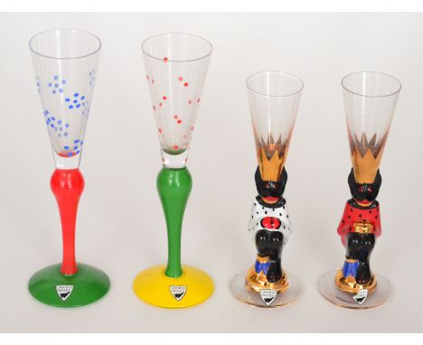 A near pair of Devil Nobel Schnapps drinking glasses designed by Gunnar Cyren for Orrefors with a conical bowl above a stylis