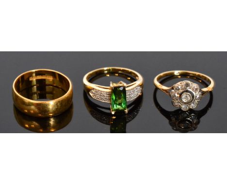 An 18ct diamond daisy cluster ring, the central collet set old cut diamond within a surround of eight millegrain set old cut 