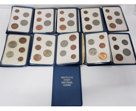 11 BRITAINS FIRST DECIMAL COIN SETS IN ORIGINAL BLUE FOLDERS