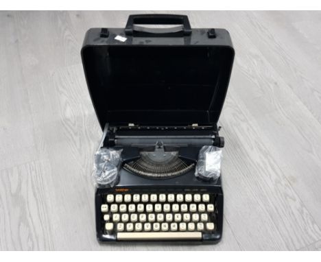 VINTAGE BROTHER TYPEWRITER IN ORIGINAL CASE
