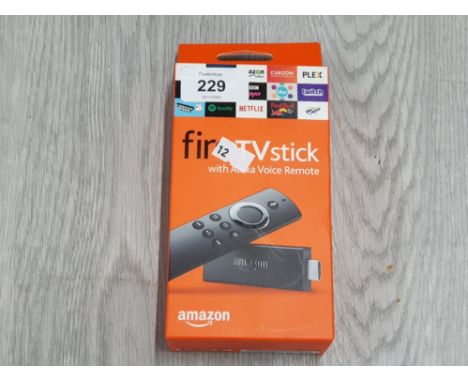 FIRE TV STICK WITH ALEXA VOICE REMOTE IN BOX