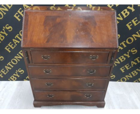 A REPRODUCTION MAHOGANY BUREAU RAISED ON BRACKET FEET 75 X 99 X 43CM