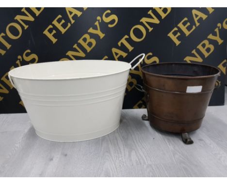 COPPER AND BRASS HANDLED COAL BUCKET ON TRIPOD FEET TOGETHER WITH ONE OTHER