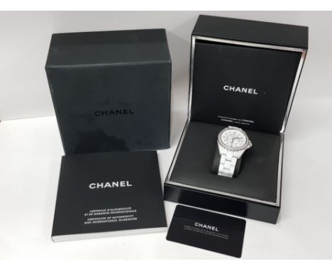WHITE CERAMIC CHANEL J12 AUTOMATIC WRISTWATCH WITH WHITE METAL DIAMOND DOT DIAL AND DIAMOND BEZEL, WITH ORIGINAL BOX AND PAPE