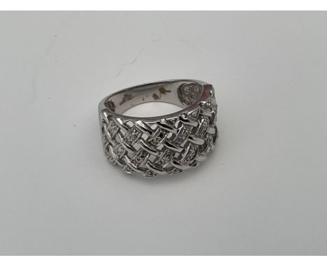 A 9ct white gold weave design ring set with small diamonds, 5.3g, O.