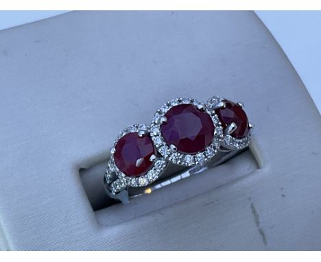 An 18ct white gold ruby and diamond ring, N.