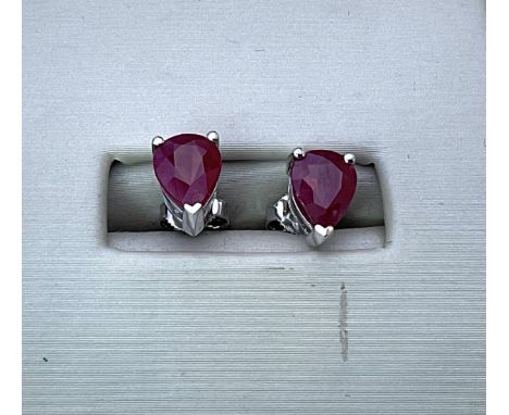 A pair of 18ct white gold and ruby stud earrings
