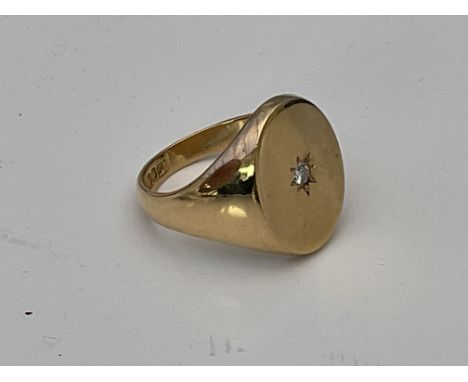 A heavy 18ct gold diamond set gents signet ring, Q.