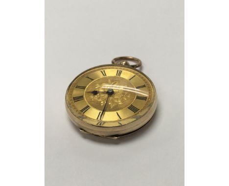 A 14 k Key wind gold pocket watch the dial with Roman numerals .