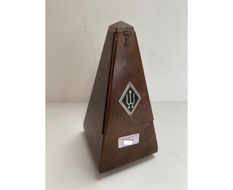 A German metronome with adjustable dial. Condition generally good 