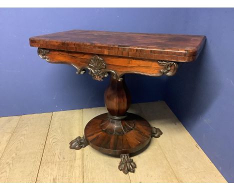 Good William IV Coromandel wood pedestal foldover card table with a newish green baize circular interior above a carved shell